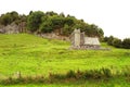 Lichen covered crenelated outer stone wall